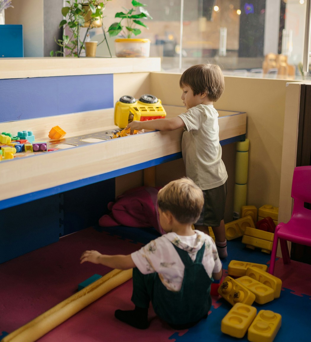 Two toddlers playing in the Children’s Wing