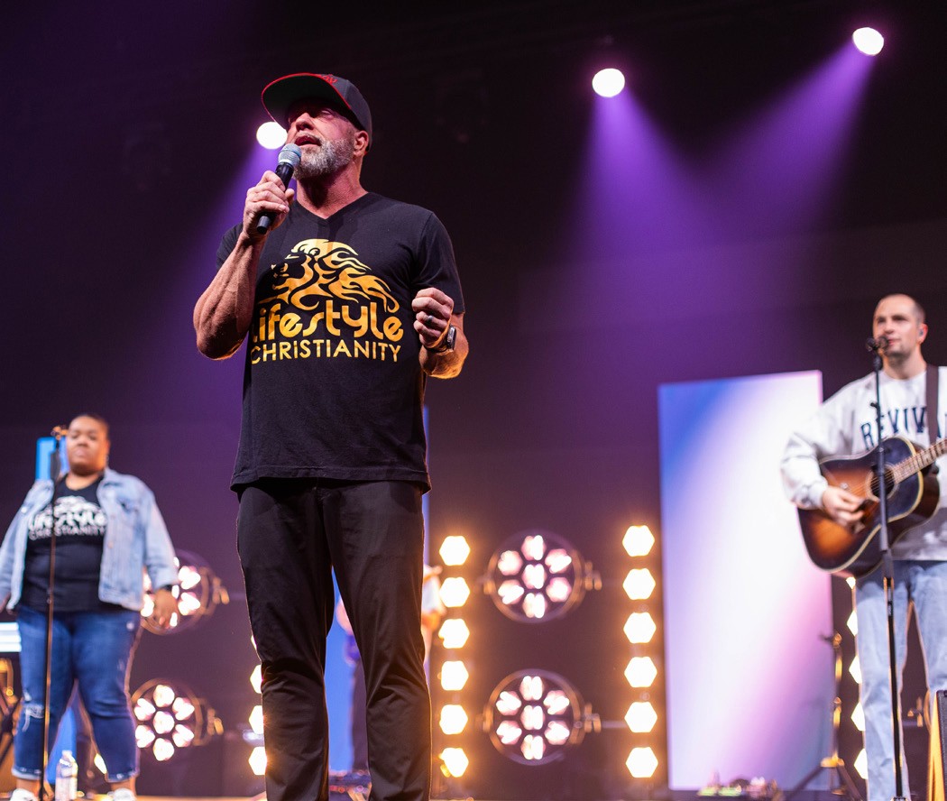Worship on stage at an Encounter Night